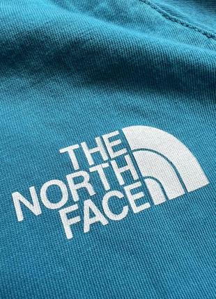 Футболка с принтом на спине the north face tnf8 фото