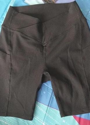 Женские шорты чёрного цвета с карманом4 фото