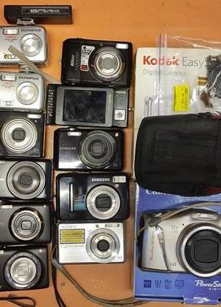 Видалений 12 фотоапаратів та об'єктив. olimpus, nikon, samsung, kodak, sony