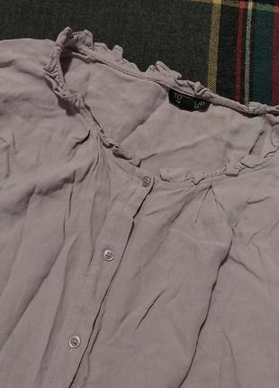 Вкорочена розширена блуза лілового кольору