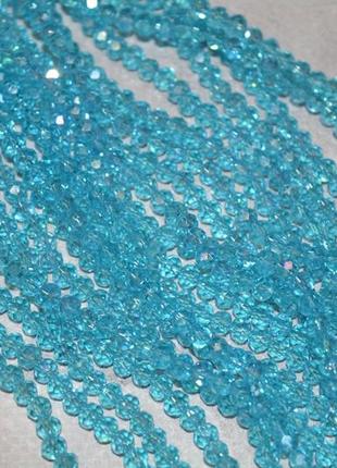 Грановані скляні намистини 3,6*4,5 мм, колір- голубий ав ,1-нитка ≈125-130 шт
