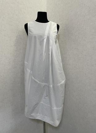 Сукня з асиметричним низом з карманами