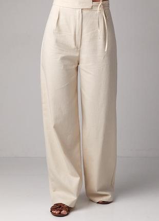 Жіночі класичні штани в ялинку брюки молочні