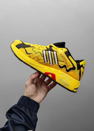 Adidas x bad bunny response yellow black1 фото