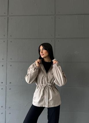 Жіноча куртка на підкладі з капюшоном застібається на змійку +шнурівка на поясі4 фото