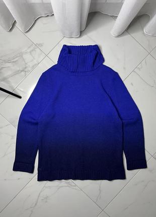 High-neck wool sweater in various shades of blue. women’s lacoste