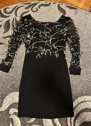 Вечірнє плаття з відкритою спиною