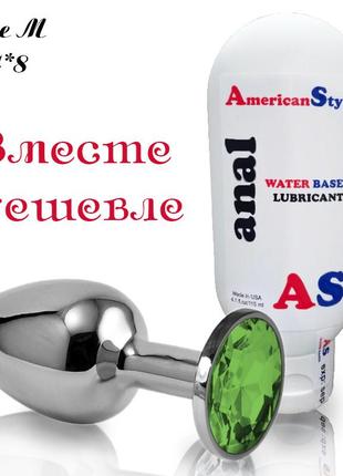 Серебристая анальная втулка м с зеленым камнем и анальный лубрикант