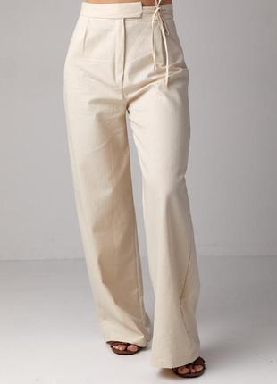 Женские классические брюки в елочку