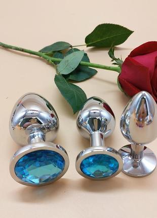 Набор металлических анальных пробок разного размера с голубым кристаллом s m l