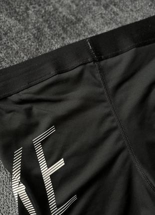 Чорні спортивні облягаючі шорти nike pro4 фото