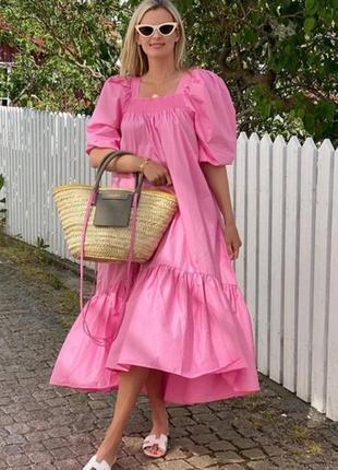 Сукня вільного фасону довжини мідв розового кольору