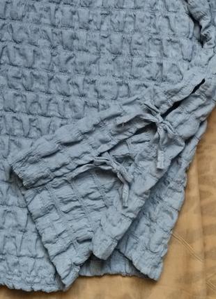 Текстурированная блуза с завязками по бокам5 фото