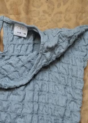 Текстурированная блуза с завязками по бокам6 фото