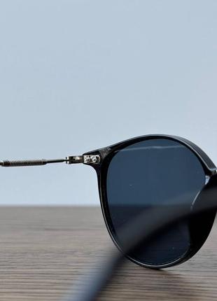 Изящные солнцезащитные очки с темными линзами3 фото