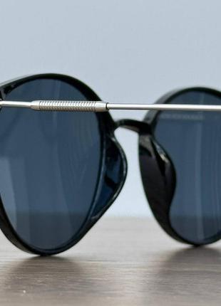 Изящные солнцезащитные очки с темными линзами7 фото