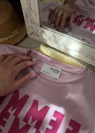 Женская розовая футболка2 фото