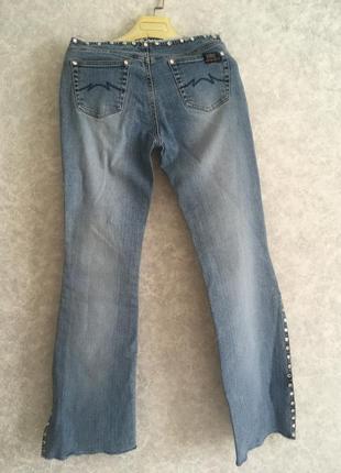Крутые джинсы с разрезами бренд 20244 фото