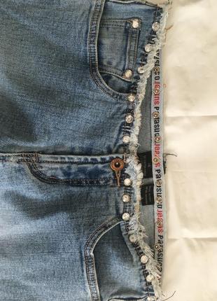 Крутые джинсы с разрезами бренд 20246 фото
