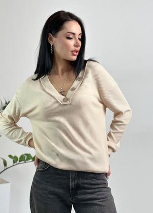 Жіночий базовий пуловер з гудзиками з вафельної тканини6 фото