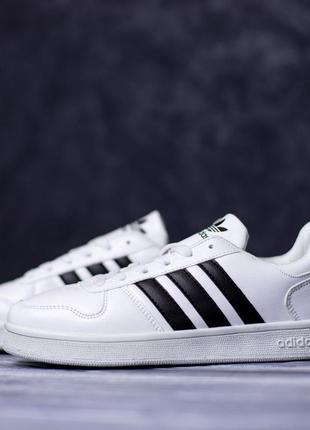 Adidas білі2 фото