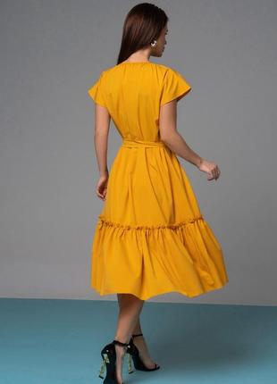Вільна гірчична сукня з воланом3 фото