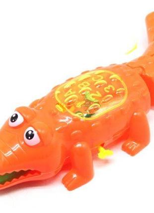 Заводна іграшка "крокодил", 31 см (помаранчевий)