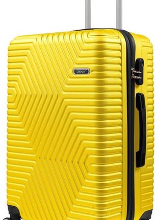 Пластиковый чемодан на колесах средний размер 70l gd polo желтый