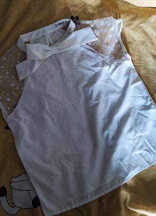 Легенька блузка на дівчинку 128 см