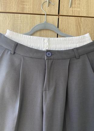 Женские брюки палаццо с имитацией белья широкие с высокой посадкой резинкой на талии7 фото