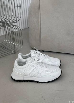 Білі кросівки9 фото