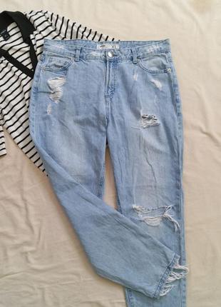 Рвані джинси, джинси з потертостями, мом джинси1 фото