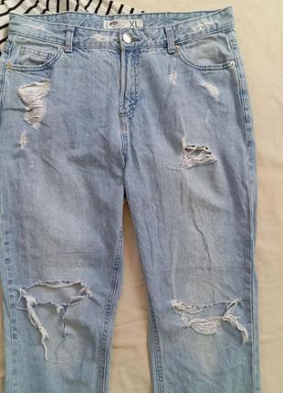 Рвані джинси, джинси з потертостями, мом джинси10 фото