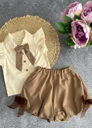 Школьный комплект для девочки весна блуза и шорты2 фото