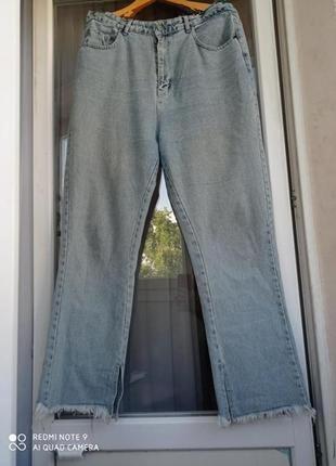 Стильні голубі джинси з бахромою і розрізами6 фото