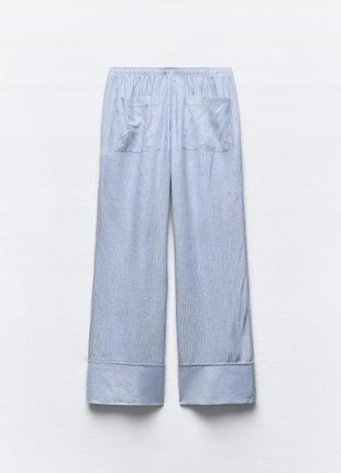 Полосатые брюки в пижамном стиле6 фото
