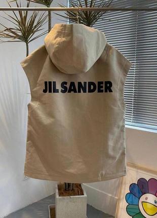 Безрукавка jil sander sml ткань коттон полинованный пропитанный как на тренчах.  тренч жилетка из вощегого хлопка