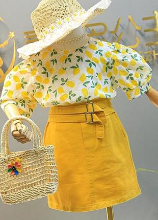 Красивый лимонный летний костюм для девочки1 фото