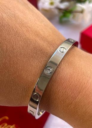 Брендовый браслет в стиле cartier love с камушками в серебре5 фото