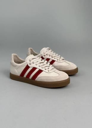 Кеди жіночі шкіряні молочні з червоними смужками