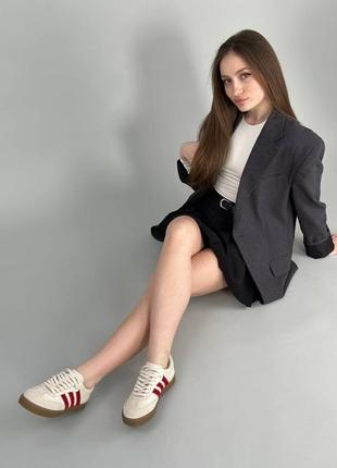 Кеди жіночі шкіряні молочні з червоними смужками