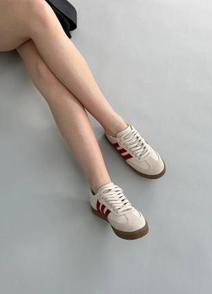 Кеди жіночі шкіряні молочні з червоними смужками