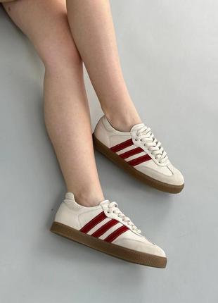 Кеди жіночі шкіряні молочні з червоними смужками