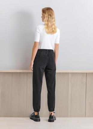 Женские джинсы "jogger" черные. размер 32.2 фото