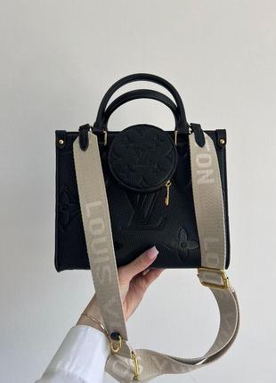 Чорна зерниста шкіряна натуральна жіноча сумка louis vuitton шлеппер луї віттом широкий ремінець на плечі лого2 фото