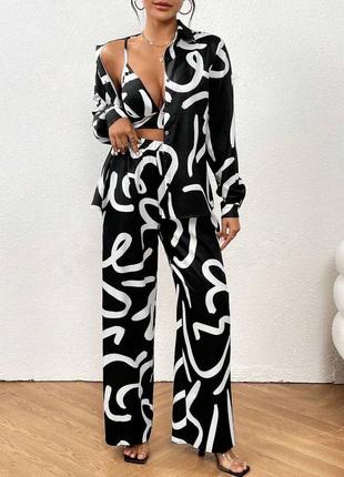 Яскравий костюм трійка принтований жіночий комплект сорочка + топ + широкі штани палаццо7 фото