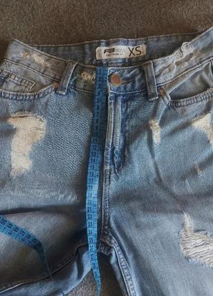Круті рвані джинси мом9 фото