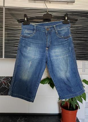 Джинсові шорти,капри з потертостями на хлопчика .