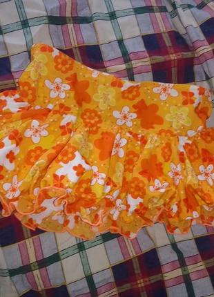 Короткая юбка на девочку оранжевая с цветами
