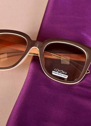 Стильні жіночі окуляри в коричнево- молочному кольорі
